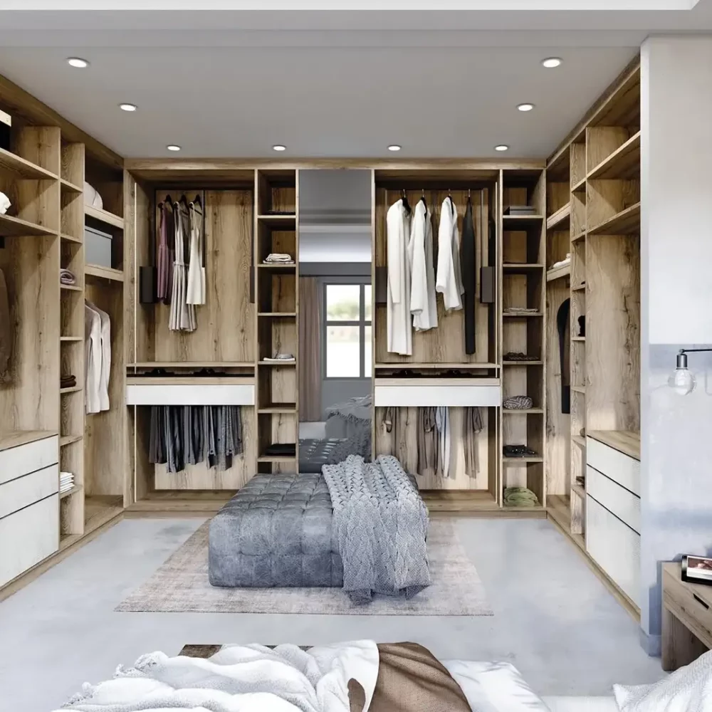 Dressing sur mesure en bois clair avec penderies et rangements, réalisé par Rodriguez Concept